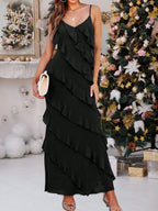 A Black Floor-length Dress and Layered Pleats