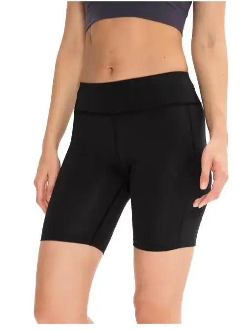 High-tummy-control shorts; pocket style.