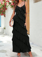 A Black Floor-length Dress and Layered Pleats