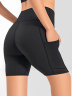 High-tummy-control shorts; pocket style.